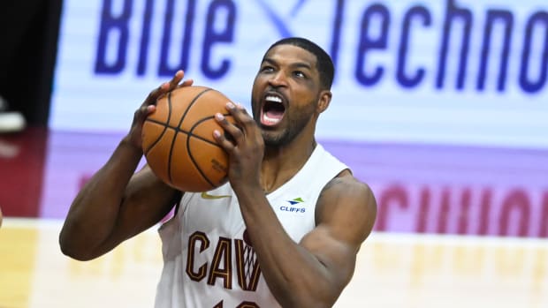 Dec 21, 2023; Cleveland, Ohio, USA; Cleveland Cavaliers center Tristan Thompson (12) rebounds in the fourth quarter against the New Orleans Pelicans at Rocket Mortgage FieldHouse.